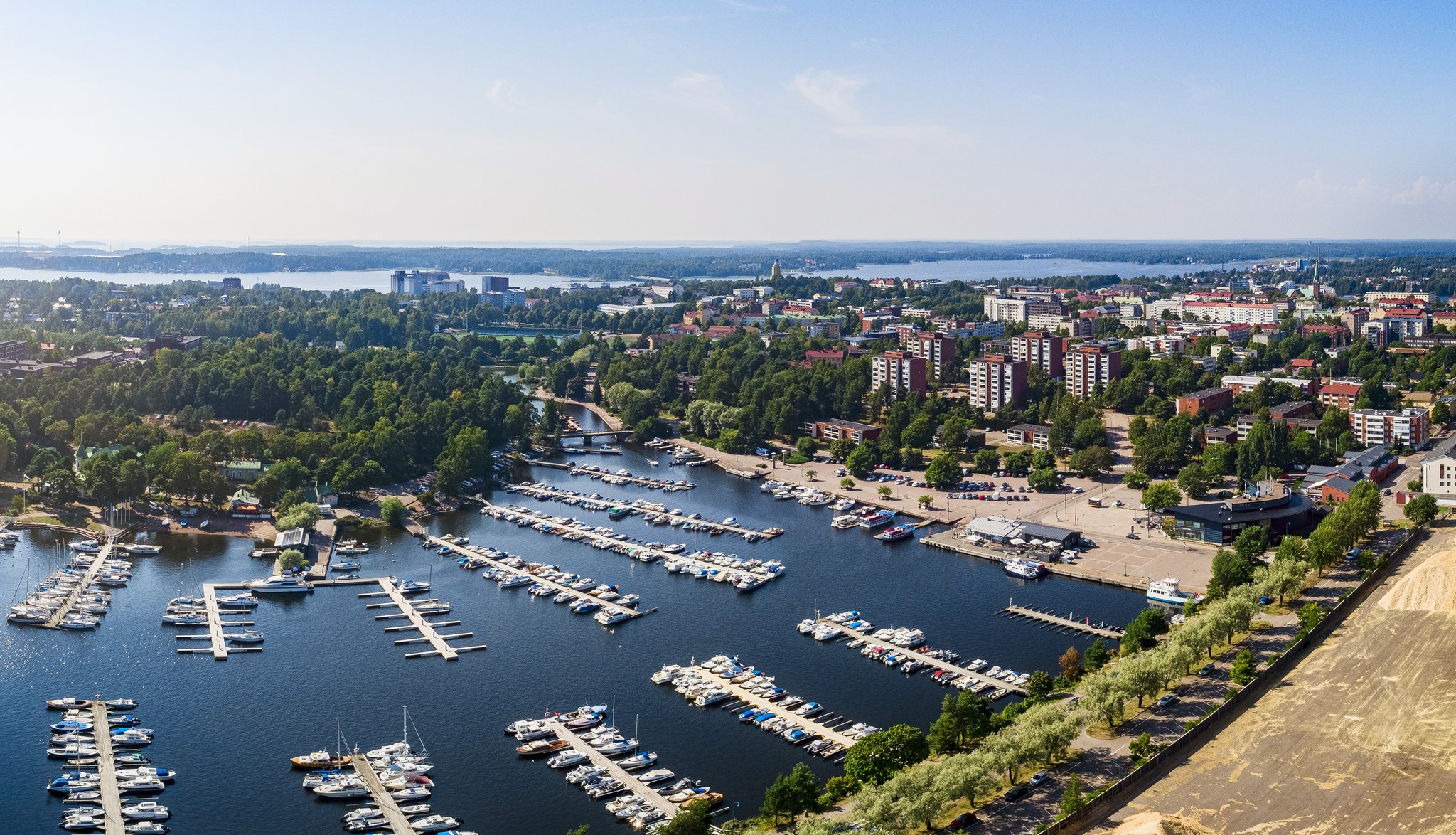 An aerial view of Sapokka Marina, with the city and park areas visible in the background.